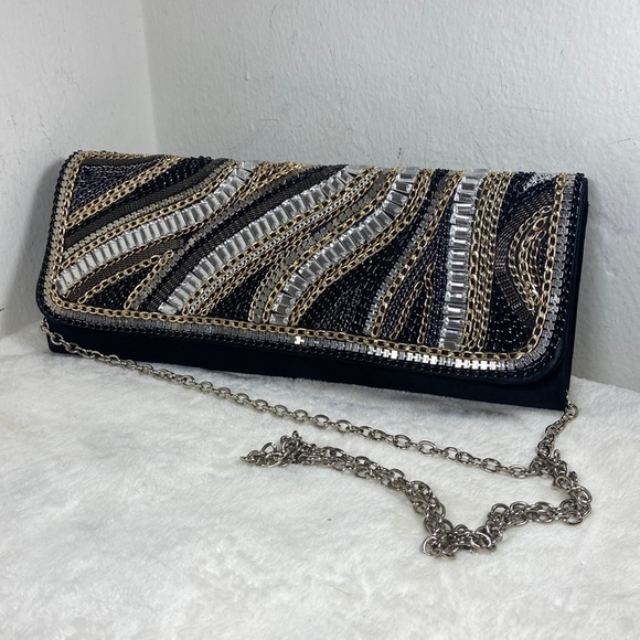 bebe Handbags - Bebe clutch with metal chain and jewel embellishment 11.5” by 4.5”